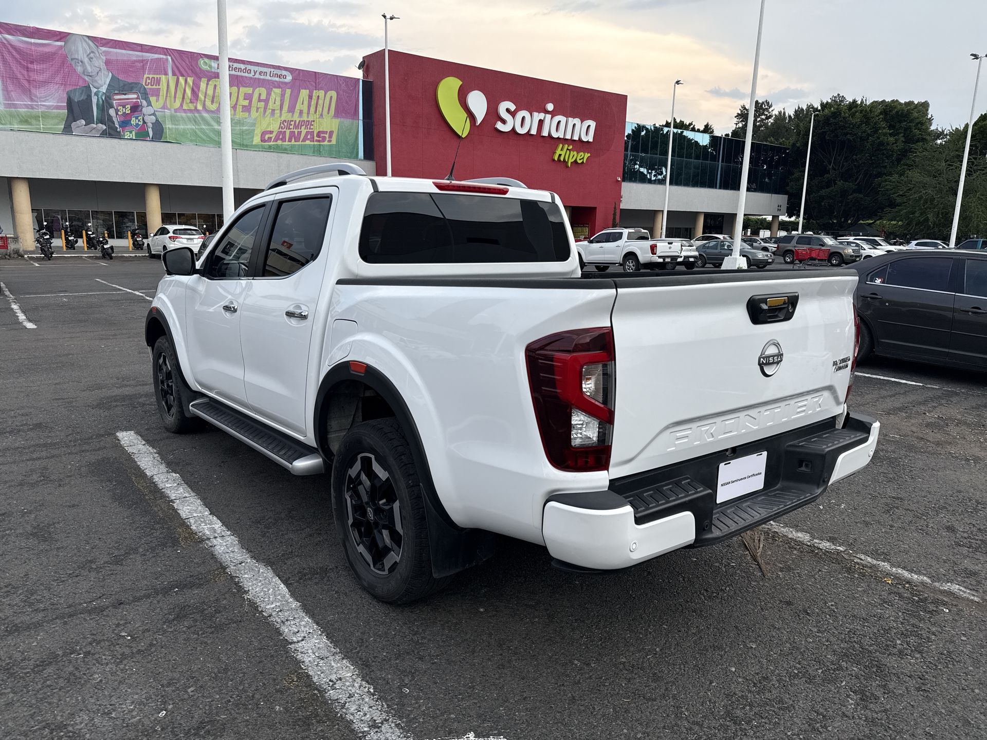 2023 Nissan FRONTIER PLATINUM LE TA 23